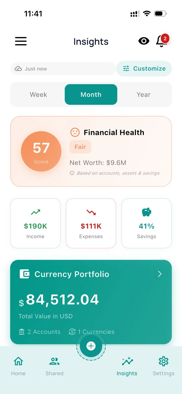 Financial health score showing 57 with net worth and currency portfolio